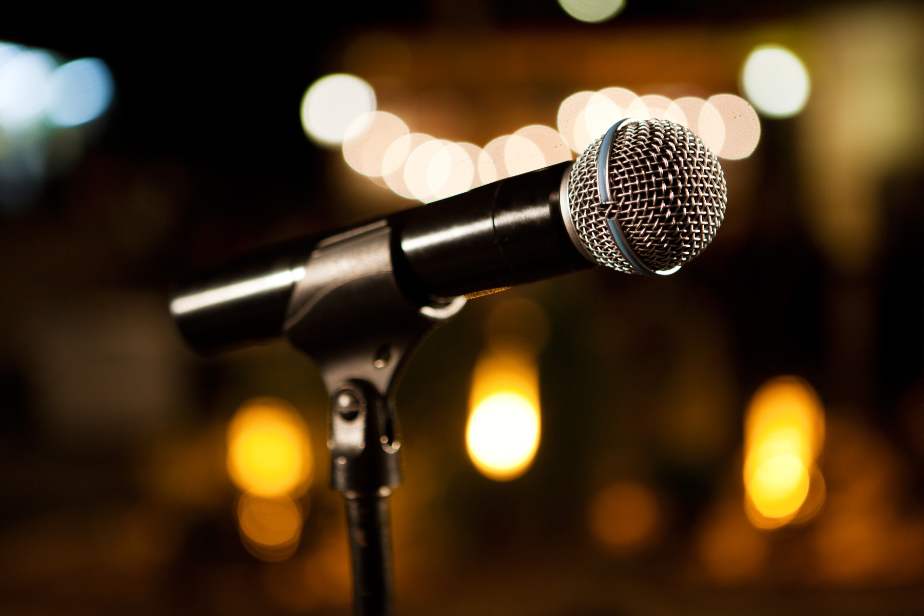 microphone with blurred lights in the background, live country music, country western, Okeechobee, Fort Pierce, Port St Lucie, Jupiter,, West Palm, Florida